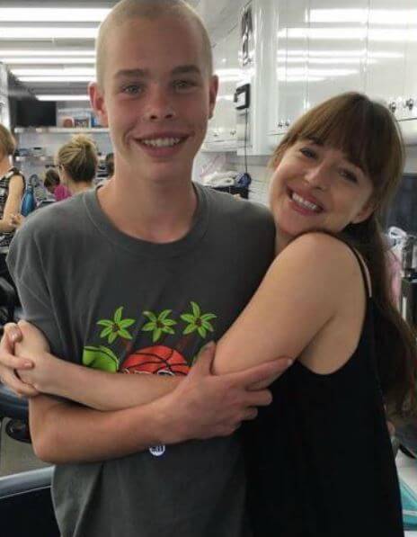 Jasper Breckenridge Johnson with his half-sister, Dakota Johnson.